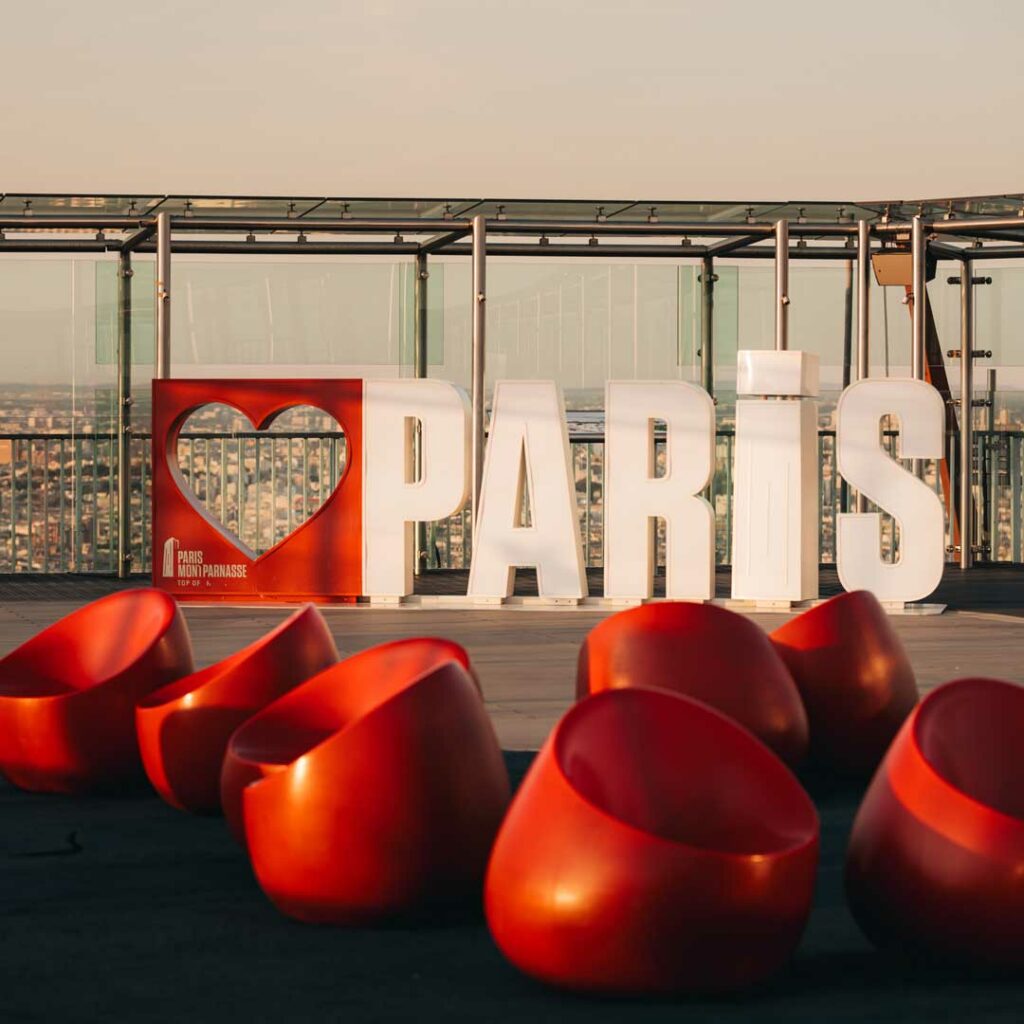large PARIS letters on the rooftop of Montparnasse Tower